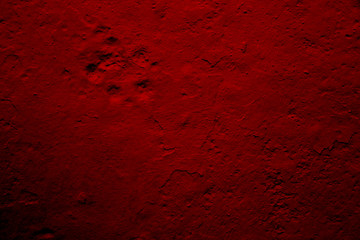 Background of red surface with the paw print of an animal. Animal paw print in red background
