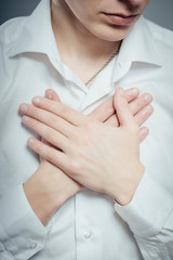 Man with his hand on heart taking an oath