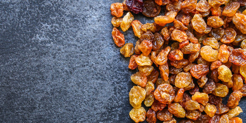 raisins, delicious dried grapes (fresh fruit vitamins) menu concept background. top view. copy space for text keto or paleo diet