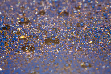 Water drops on a colored background