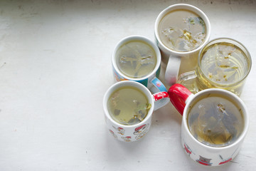 cups of tea for a tea party with guns
