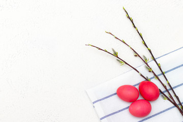 Fototapeta na wymiar Painted Easter eggs and willow branch. Pink eggs. Religious holiday. Place under the text. Easter banner.