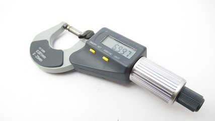 A isolated micrometer with a digital display,Located on white background,Easy to use in any work