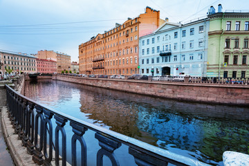 Moika river and neberezhnaya Griboyedov canal embarkment view towards Kokushkin Most bridge in Saint Petersburg, Russia