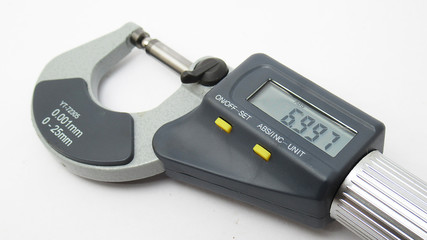 A isolated micrometer with a digital display,Located on white background,Easy to use in any work