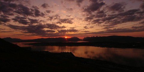 Obraz premium tromso tromsø water travel tourism sea coast nature port blue landscape sky harbor architecture europe boatship mountain summer bay view city beautifull and mark mediterranean v