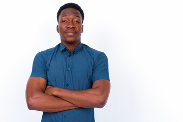 Young handsome African man against white background