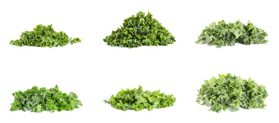 Naklejka premium Set of fresh green kale leaves on white background