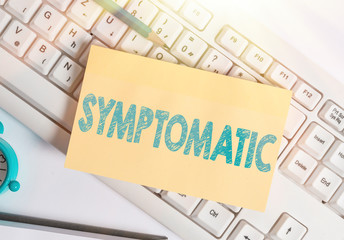 Writing note showing Symptomatic. Business concept for serving as symptom or sign especially of...