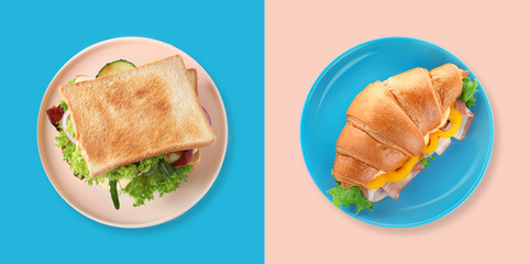 Yummy sandwich and croissant on color background, top view