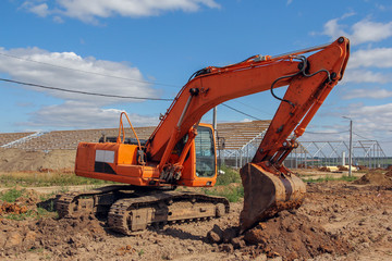 Crawler excavator front view. Special equipment for construction. Powerful unit