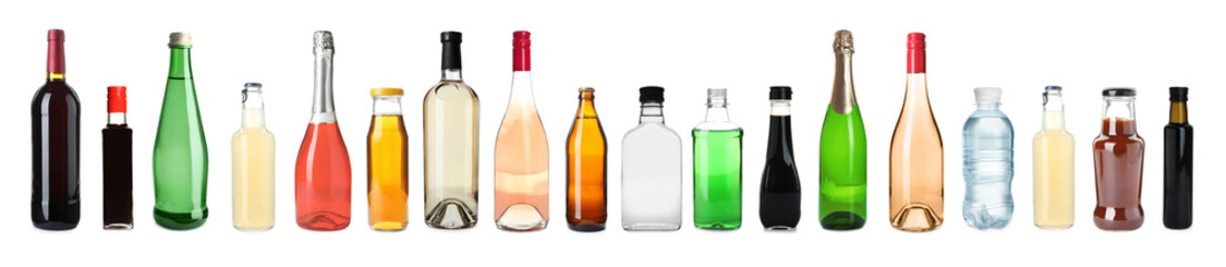 Set of bottles with different liquids on white background. Banner design