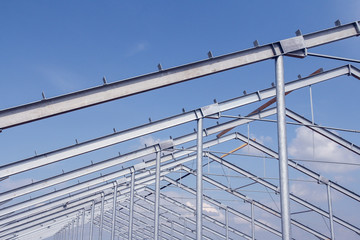 Steel beam structure on new building. Fast building construction