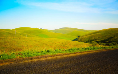 Empty Road and Nature of countryside with green hills reflex