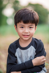 Thai children and nature blur background.