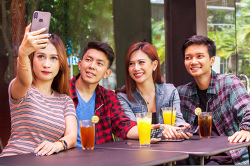 College students taking selfie photo together