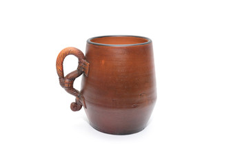 brown clay mug