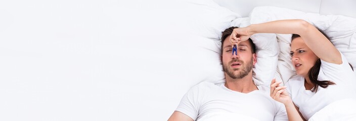 Woman Trying To Stop Man's Snoring With Clothespin