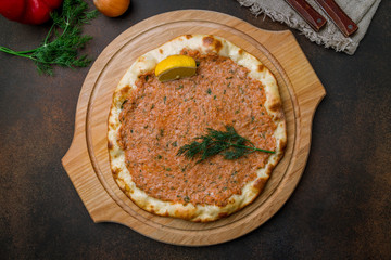 lahmacun Turkish cuisine on brown concrete table
