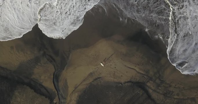 Aerial view of surfer at the beach, Kedungu, Bali, Indonesia