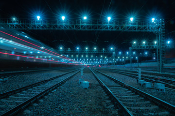 Fototapeta premium Long-exposure photograph night rail way .Moscow