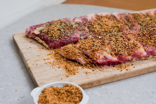 preparing ribs with a dry herb rub