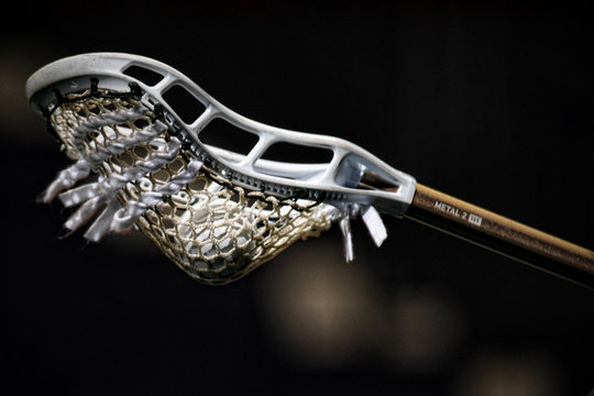 Lacrosse stick and game ball
