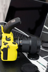 Camera Photography Design Studio Editing Concept. Camera in a yellow case.