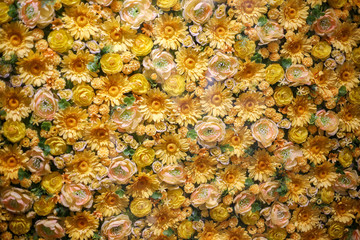 flower background of various yellow flowers, chamomile, rose, Chinese rose, forget-me-not, oaks many colors on one background