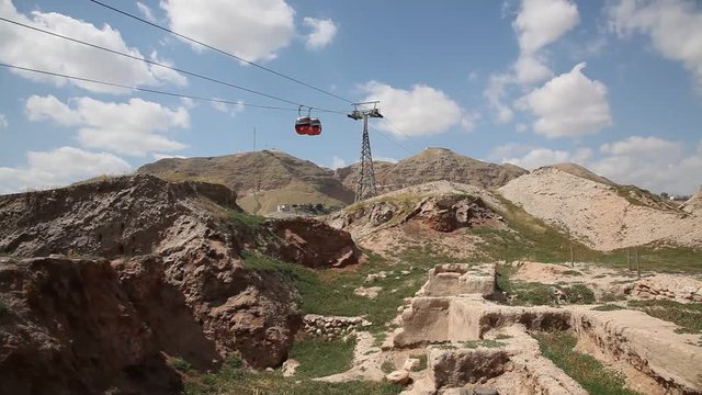 Riding the cable car from Mount of Temptation to Jericho. Mount of Temptation is a hill in the Judaean Desert where Jesus was tempted by the devil. 