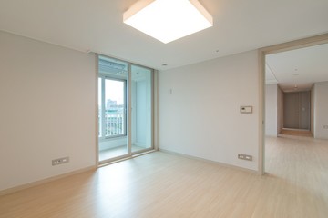Interior of an empty master bedroom in a new apartment. 
New apartment interior in South Korea.
