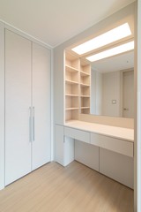 Interior of a dressing table space in a new apartment. New apartment interior in South Korea. Built in dressing table.