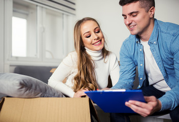 Love couple doing relocation at new home