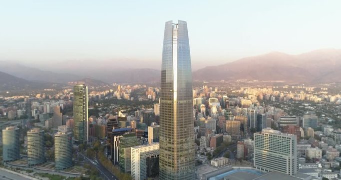 Aerial view of the highest skyscraper in Santiago de Chile during sunset. Sky Costanera. 4K.
