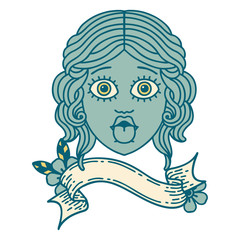 tattoo with banner of female face sticking out tongue