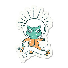 grunge sticker of tattoo style cat in astronaut suit