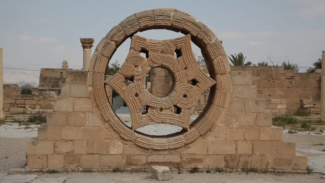 A window at Hisham's Palace is an early Islamic archaeological site north of the town of Jericho in the West Bank. It consists of three main parts: a palace, an ornate bath complex