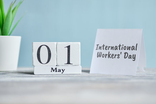 Holiday International Workers Day - 1 first May Month Calendar Concept on Wooden Blocks.
