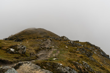 Perspective view into cloud on the edge of a hill
