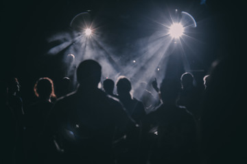 crowd of people dancing on stage