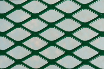 green metal lattice grid background