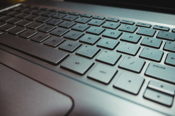 laptop computer keyboard with the surface of the mouse