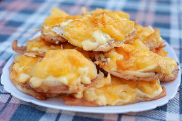 french chops dish of chicken meat pineapple and cheese