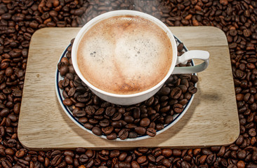Coffee cup and beans coffee  on a white background. coffee cup and coffee beans.