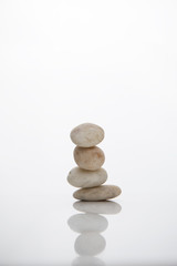 Fototapeta na wymiar stack of white natural stone in zen wellness health therapy concept
