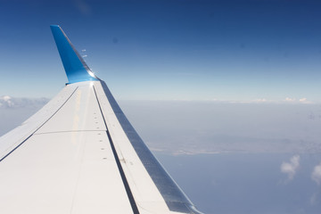 Fototapeta na wymiar View from the plane on a sunny day