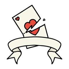 tattoo with banner of a torn card