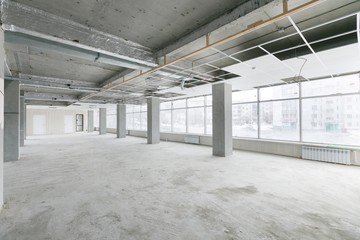 empty pure commercial office building undecorated in gray colors.open space office
