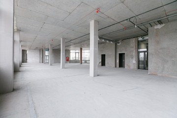 empty pure commercial office building undecorated in gray colors.open space office