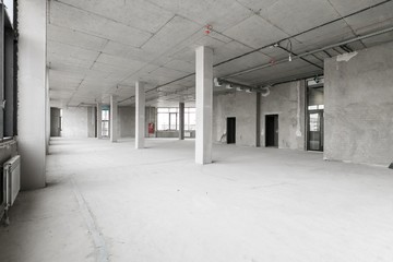 empty pure commercial office building undecorated in gray colors.open space office